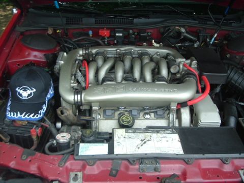 1993 Ford Taurus - The SHO 3.0L V6 24 Valve DOHC engine is visible in the engine bay of this 1993 Ford Taurus SHO.
