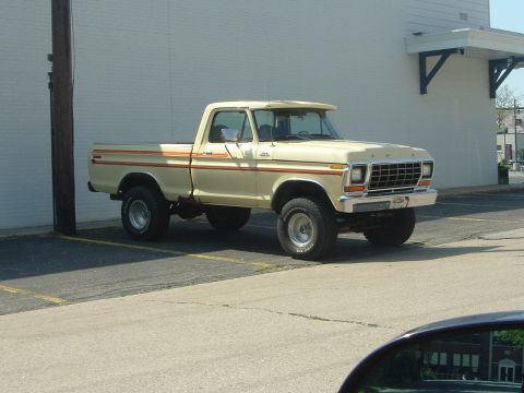 1993 Ford Taurus - This pickup truck, likely from the 1970s, does not match the registry's claim of a 1993 Ford Taurus.