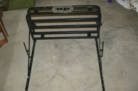 2003 Jeep TJ - This is a rear cargo rack, likely for an SUV or Jeep, with a diamond plate accent.