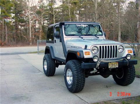 1995 Dodge 1500 - This Jeep Wrangler Rubicon is equipped with a snorkel and large off-road tires.