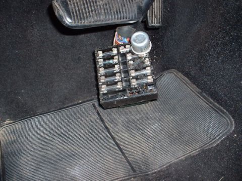 1978 Ford Mustang II - Interior view of the fuse box and pedals in a 1978 Ford Mustang II.