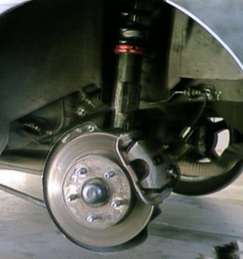 1989 Ford Tempo - Yea a set of rear SHO brakes in now, this thing can stop on a dime and then give you change... best part there was no cutting or welding ju…