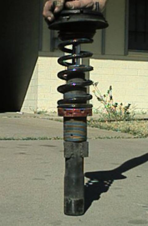 1989 Ford Tempo - Custom made front coil over, cut off the old spring perches, and welded on new spring perches, this is aso another easy mod that anyone can…