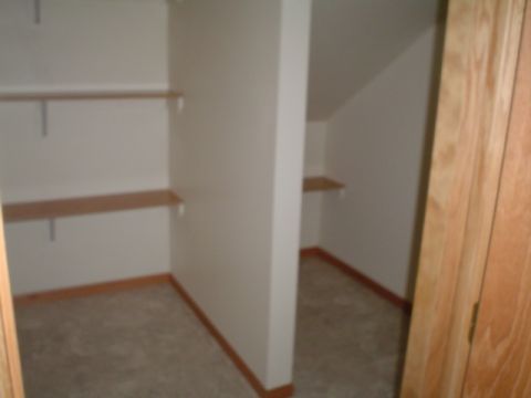1981 Ford Bronco - storage under stairs, off of lower living room