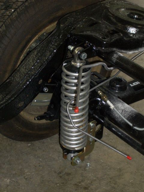 1967 Pontiac GTO - Rear suspension component, likely a coilover shock absorber, attached to the vehicle's frame.
