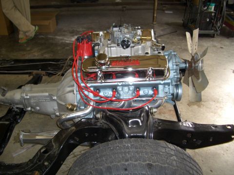 1967 Pontiac GTO - Engine and transmission assembly, likely from a 1967 Pontiac GTO, undergoing restoration.