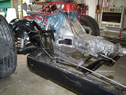 1967 Pontiac GTO - The engine and transmission assembly is partially visible, mounted on a black frame.