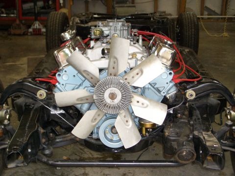 1967 Pontiac GTO - Engine and chassis assembly, likely from a 1967 Pontiac GTO, undergoing restoration.