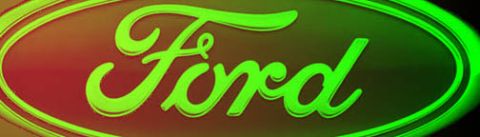 1994 Ford Bronco - A close-up of the Ford emblem is shown with a vibrant gradient effect.
