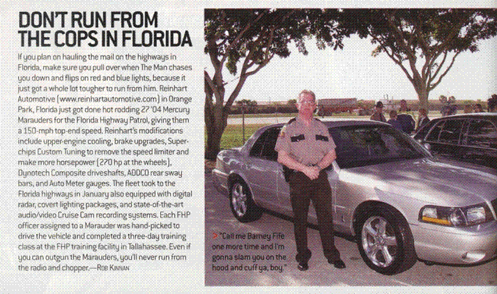Silver 2000 Ford Crown Victoria, 3/4 front view, with person