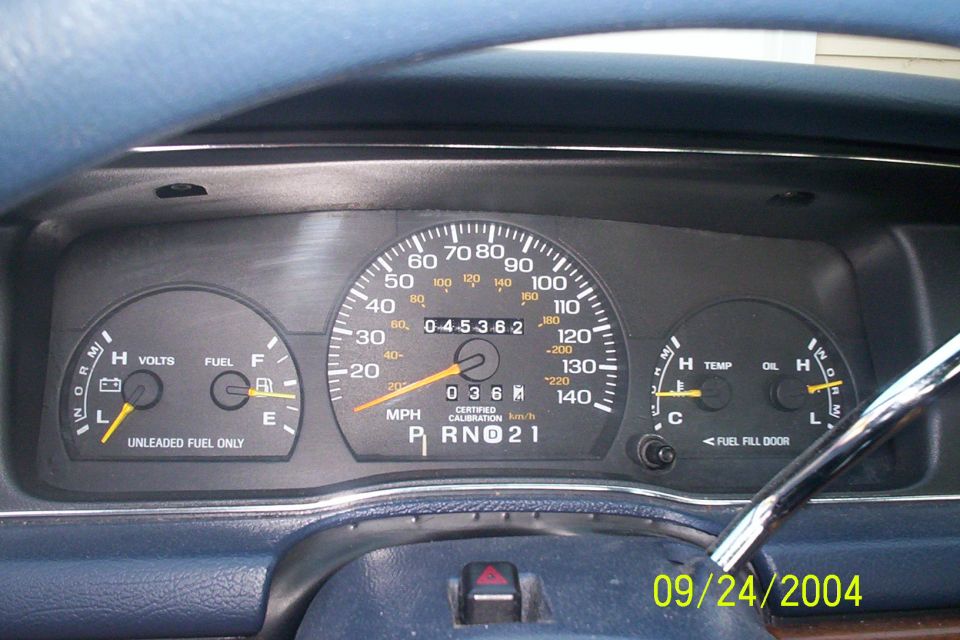 1994 Ford Crown Victoria dashboard gauges showing 45,362 miles and P, R, N, D, 2, 1 gear selection