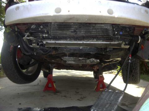 1997 Ford Taurus - Hot fluid goes first to lower tube and fin cooler which lays horizontal then to bumper mounted Gen 2 cooler then to OEM tube cooler then ba…