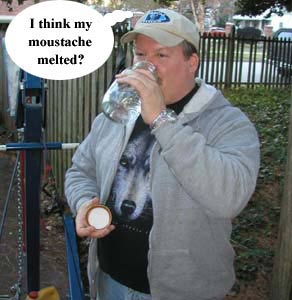 1988 Ford Bronco - A man drinks from a glass while holding a small white object, with a speech bubble saying 'I think my moustache melted?'.