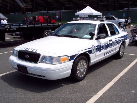 2001 Ford Crown Victoria - East Hartford Police traffic unit, a Ford Crown Victoria, parked at an outdoor event.