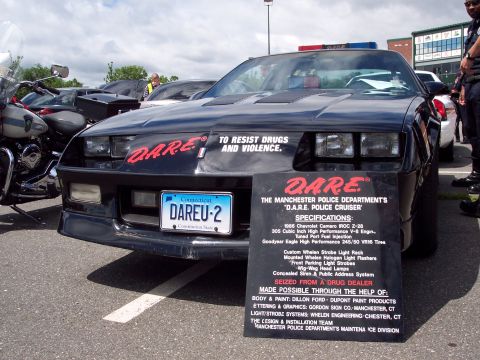 2001 Ford Crown Victoria - This 1988 Chevrolet Camaro Z-28 police cruiser is displayed with its specifications and DARE branding.