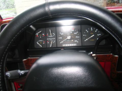1989 Ford Bronco II - Dashboard view of a 1989 Ford Bronco II, gauges for speed, RPM, fuel, and temperature.