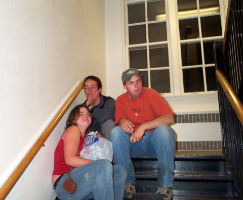 1996 Ford Bronco - Three individuals are seated on a staircase, with a large window visible in the background.