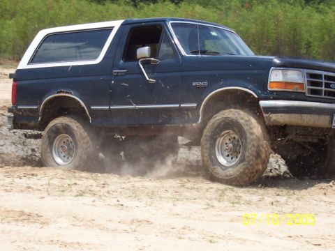 1987 Ford Bronco - 1987 Ford Bronco navigating an off-road trail on July 10, 2005.