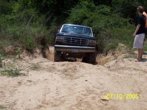 1987 Ford Bronco - This black Ford Bronco navigates a challenging off-road path on July 10, 2005.