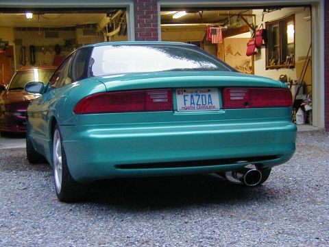1994 Ford Probe - Rear view of a 1994 Ford Probe with a custom exhaust tip.