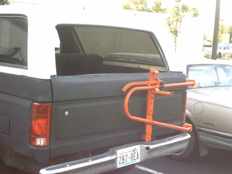 1995 Ford Bronco - This 1995 Ford Bronco features a rear-mounted spare tire carrier and a Washington state license plate.