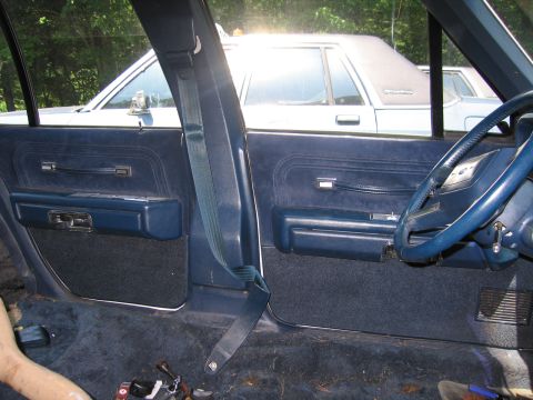 1991 Ford LTD Crown Victoria - Interior of a 1991 Ford Crown Victoria LTD, with another vehicle seen through the window.