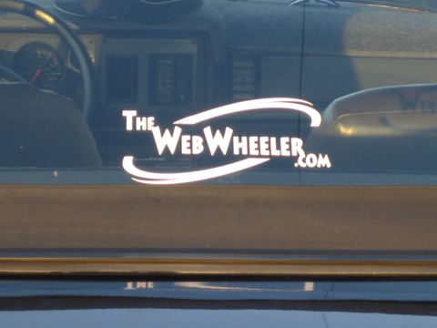 1985 Ford Mustang - A sticker on the car window reads "The Web Wheeler.com".
