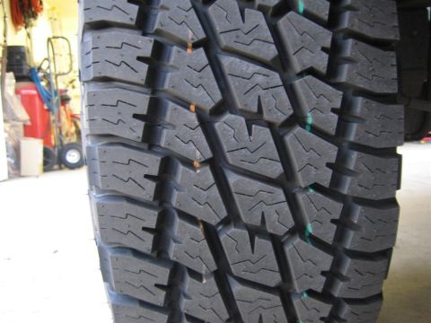 1999 Ford F-250 - The image shows a close-up of a tire, not the vehicle itself.