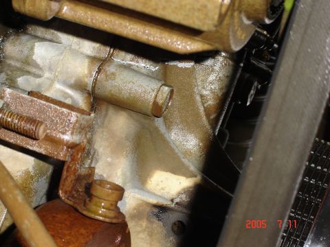 1993 Ford Bronco - This image shows a close-up view of an engine component, possibly showing signs of an oil leak.