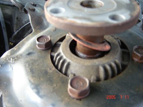 1993 Ford Bronco - Water pump part with visible spring and bolts, timestamped 2005.
