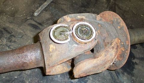 1990 Ford Bronco - Stubborn joints will spit the ends of their caps like this as you press them out. If necessary load up the press and then give the joint a…