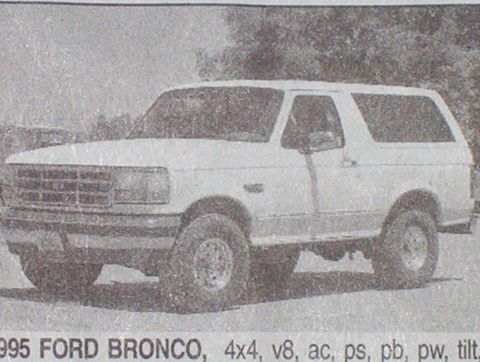 1995 Ford Bronco - 1995 Ford Bronco 4x4 with V8 engine and AC is shown in a newspaper clipping.