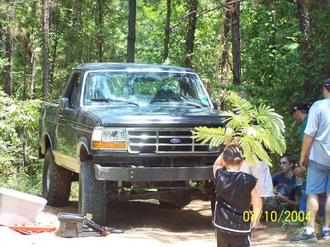 1987 Ford Bronco - This SUV features a chrome grille and a heavy-duty aftermarket bumper, suggesting modifications for off-road use.