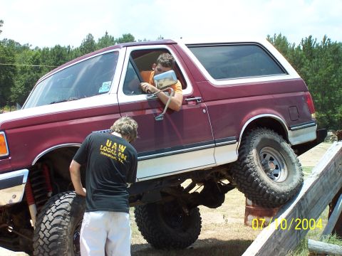 1987 Ford Bronco - This 1987 Ford Bronco is navigating an off-road obstacle course with assistance.