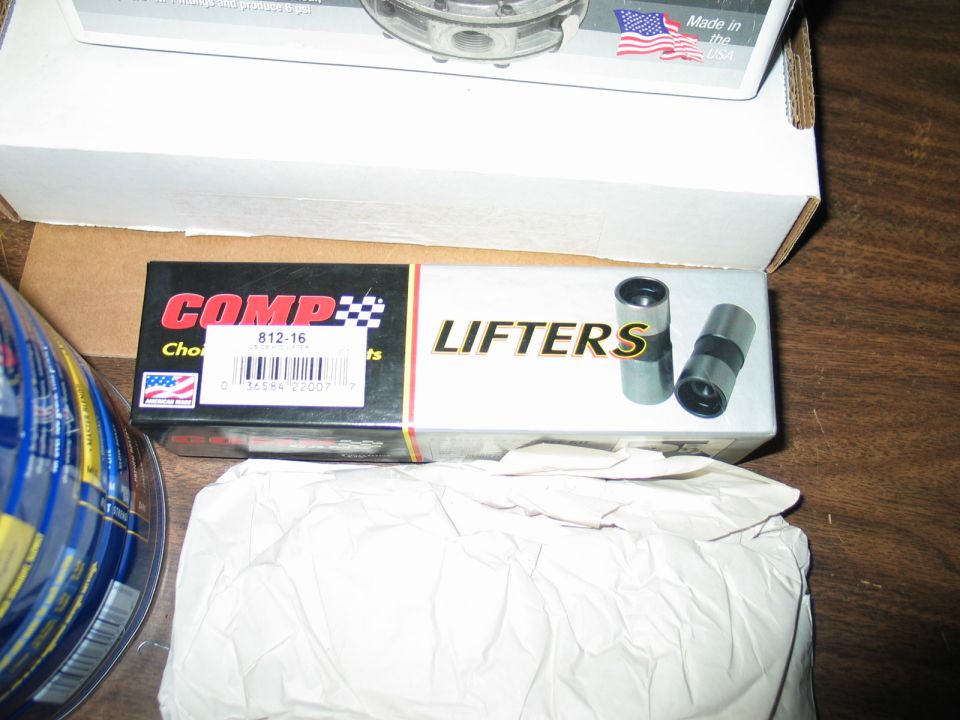 Box of COMP Cams lifters with part number 812-16 and two lifters shown