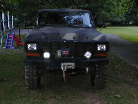 1979 Ford Bronco - This Ford Bronco, likely from the late 1970s, is equipped with a winch and aggressive off-road tires.