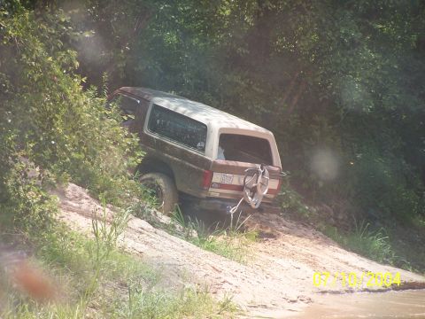 1987 Ford Bronco - This 1987 Ford Bronco is seen navigating a challenging off-road trail.