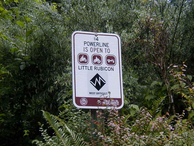 Trail sign: #4 Powerline open to Little Rubicon, most difficult rating