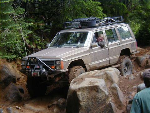 1994 Ford Explorer - This SUV is equipped for off-road adventures on a challenging rocky path.