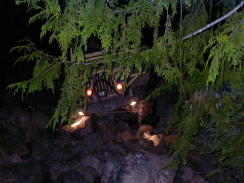 1994 Ford Explorer - An off-road vehicle navigates a challenging rocky path under the cover of darkness.