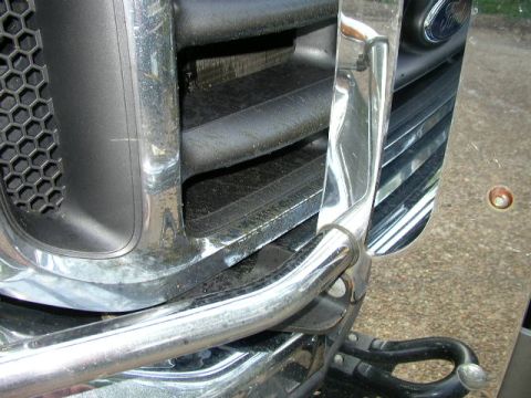 1995 Ford Bronco - Front grille and bumper detail on a Ford truck, likely from the early 2000s.