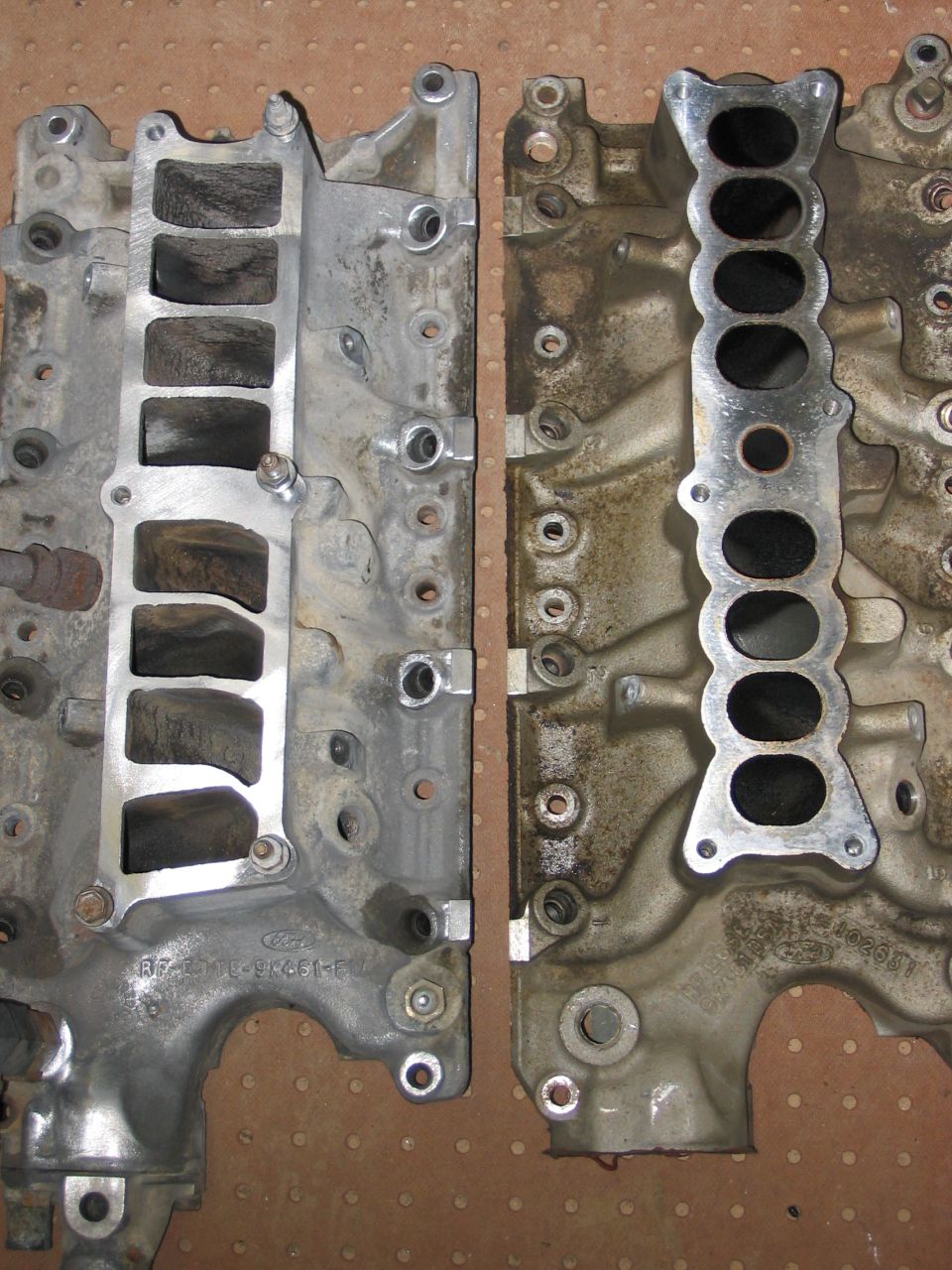 Truck lower intake on left, mustang lower intake on right.  I'll be using the truck intake.