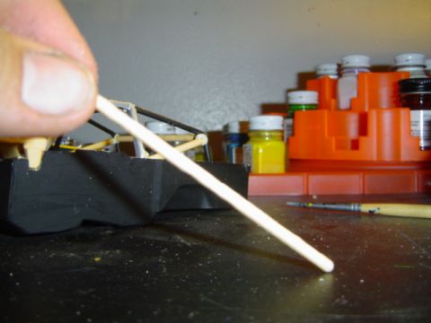 1979 Ford Bronco - Model car assembly in progress with hobby paints and tools visible.