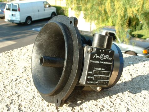 1992 Ford Crown Victoria - A black ProFlow part is shown, with readable text including a model number and phone number.