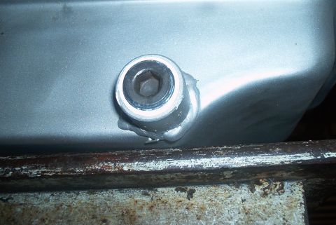 1983 Ford Bronco - Close-up of a C6 drain plug, a hex socket for removal.