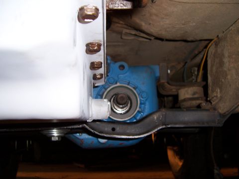 1983 Ford Bronco - Underside view of a vehicle's differential housing, showing its connection to other components.