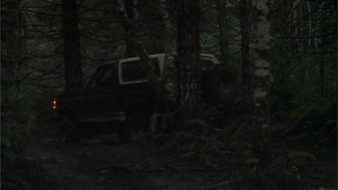 1996 Ford Bronco - Cedar Tree Trail, Carey Navigating a tight turn through the trees. (7/8/2005)
