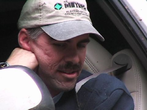 1996 Ford Bronco - Mini-Rubicon, Greg Waiting for winch line to be hooked up while going down Mini-Rubicon. (7/9/2005)