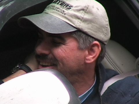 1996 Ford Bronco - Mini-Rubicon, Greg Having a laugh while waiting for winch line to be hooked up while going down Mini-Rubicon. (7/9/2005)