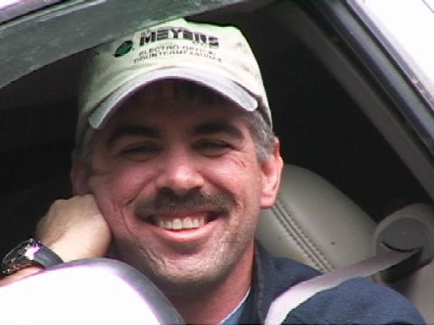 1996 Ford Bronco - Mini-Rubicon, Greg Having a laugh while waiting for winch line to be hooked up while going down Mini-Rubicon. (7/9/2005)